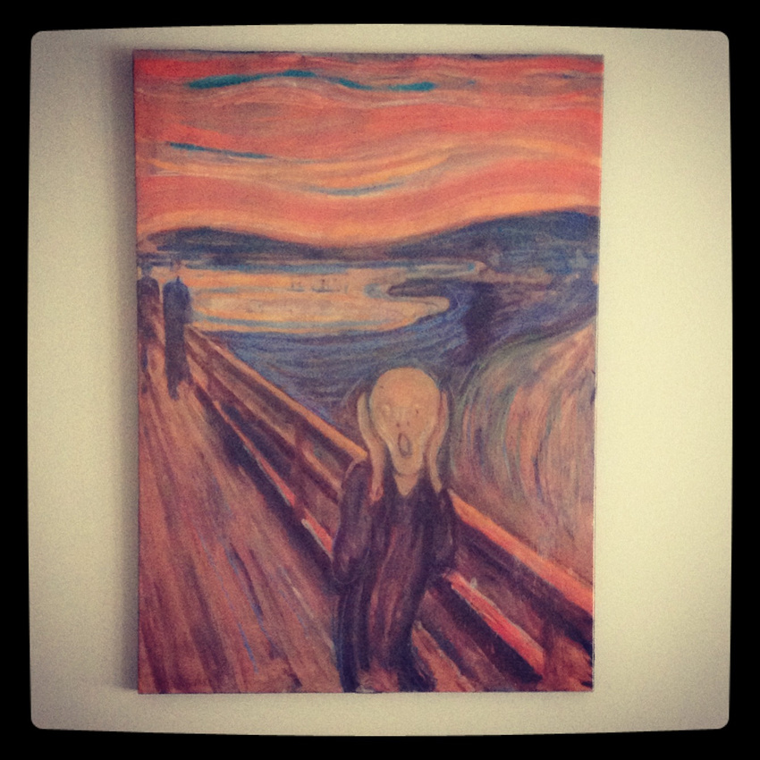 The Scream canvas reproduction hanging on wall