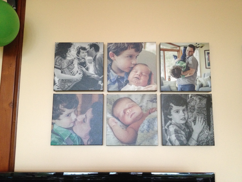 Canvas wall display of newborn and maternity photos taken in Richmond Hill